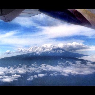 Mr. Kilimanjaro rises under the wing of our pl... Mr. Kilimanjaro rises under the wing of our pl...